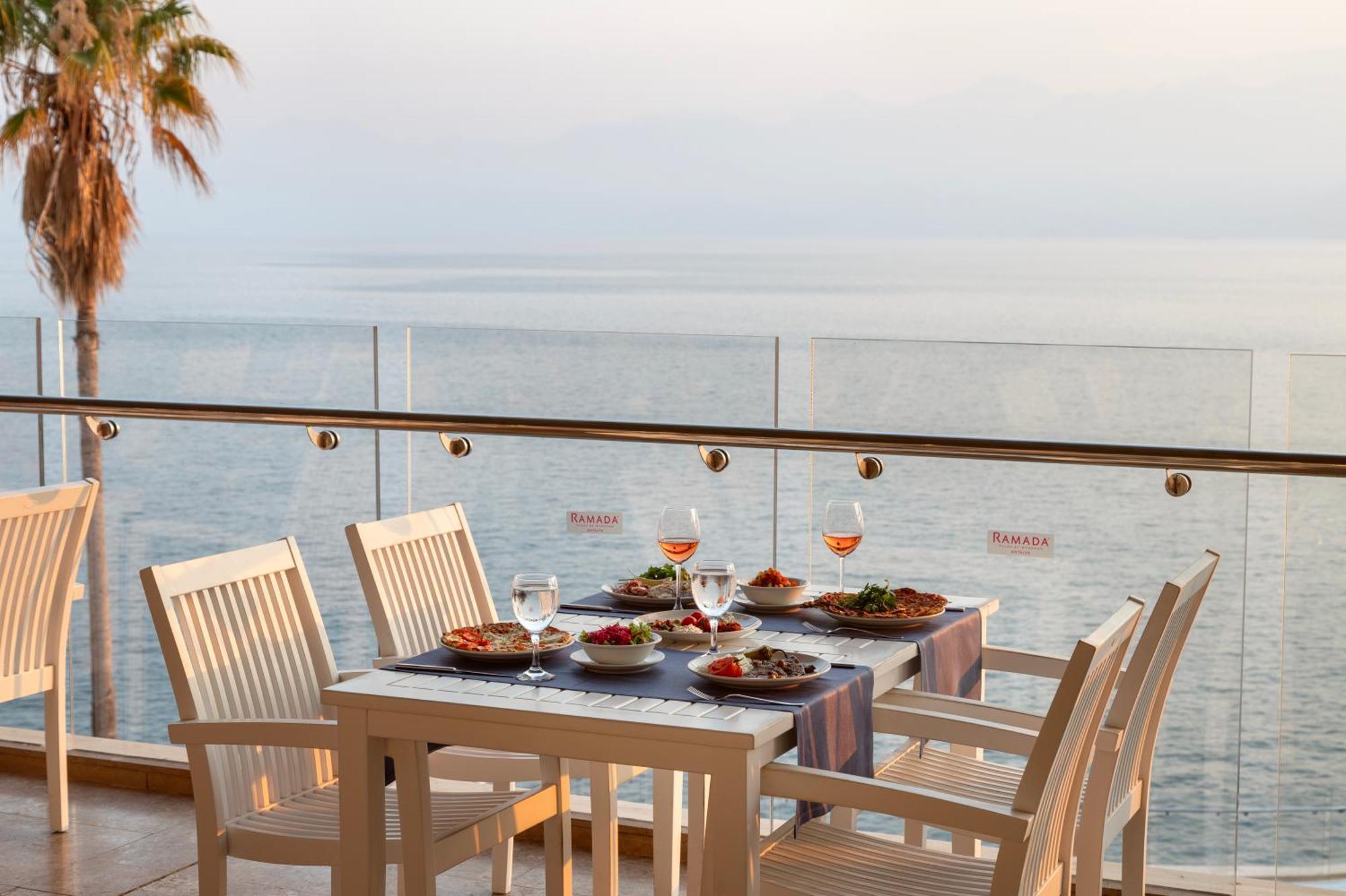 Ramada Plaza Antalya Hotel Exterior photo A glass balustrade