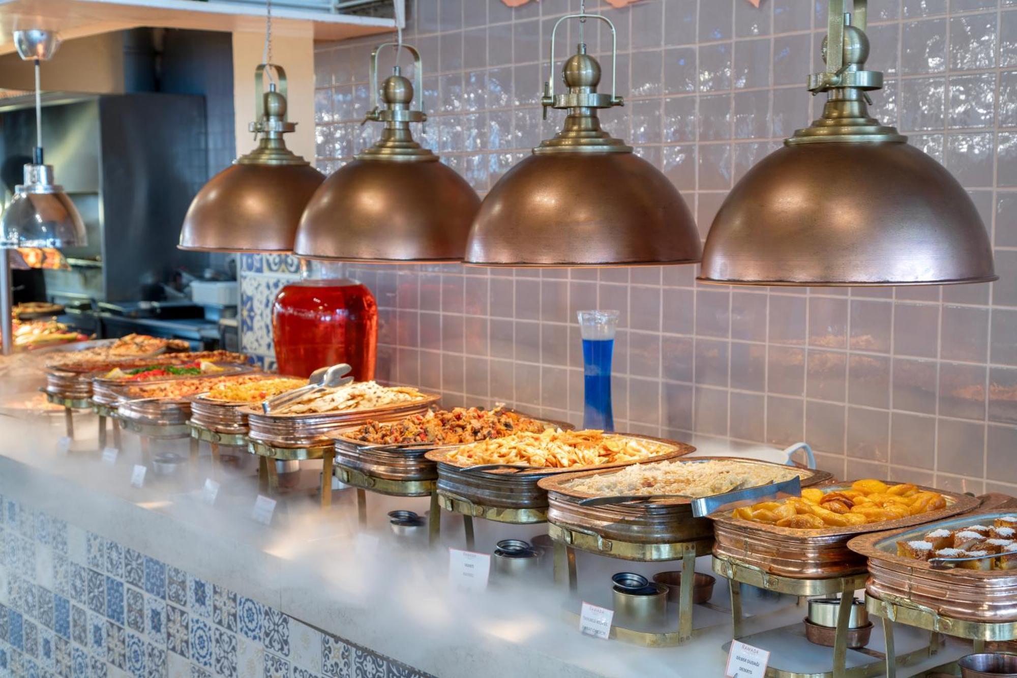 Ramada Plaza Antalya Hotel Exterior photo A buffet at a restaurant