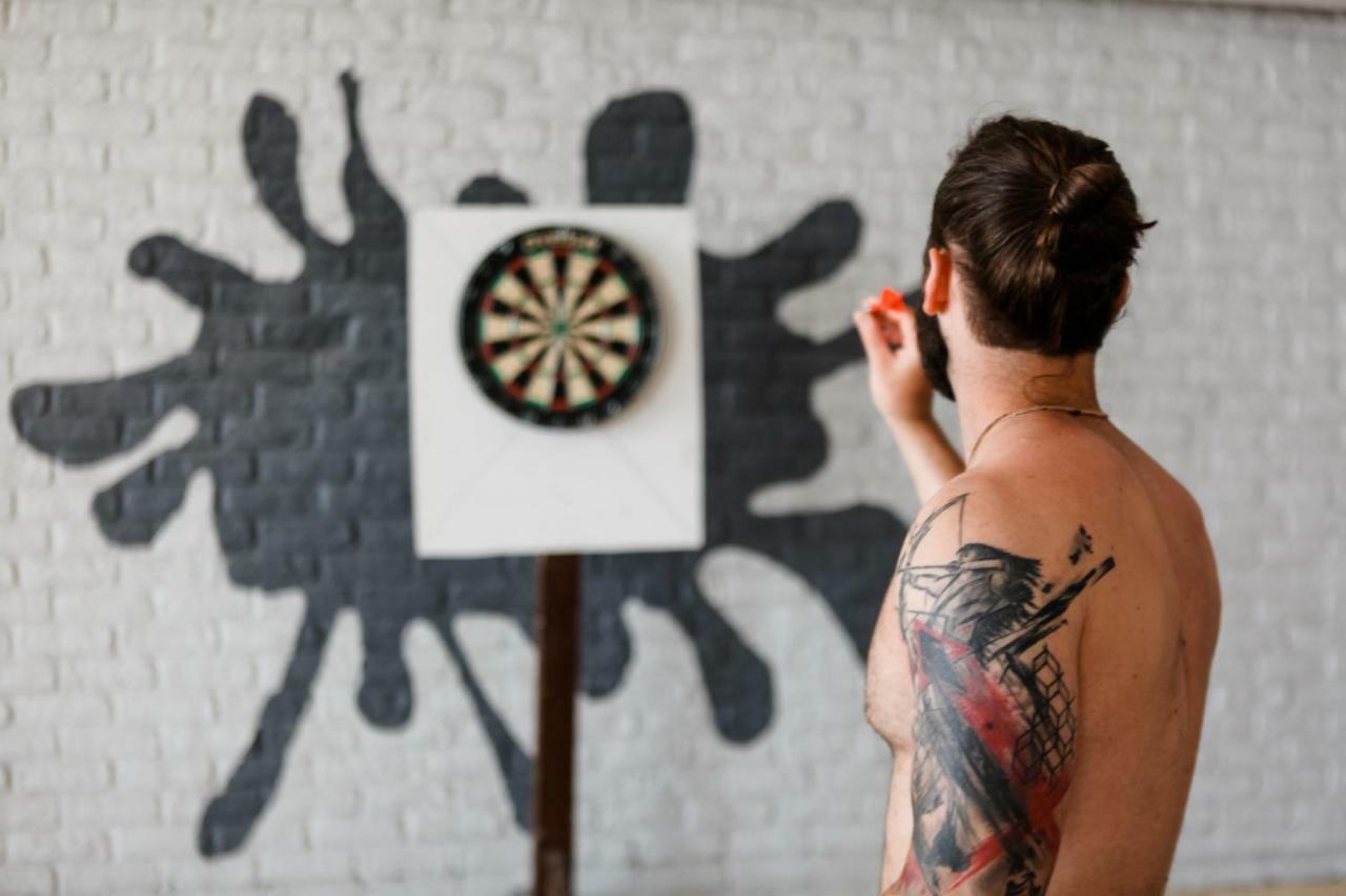 Ramada Plaza Antalya Hotel Exterior photo A player throwing a dart